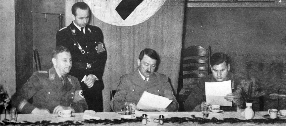 Adolf Hitler at a work meeting with SA leader Viktor Lutze and Hitlerjugend leader Baldur von Schirach in hotel Platterhof on the Obersalzberg